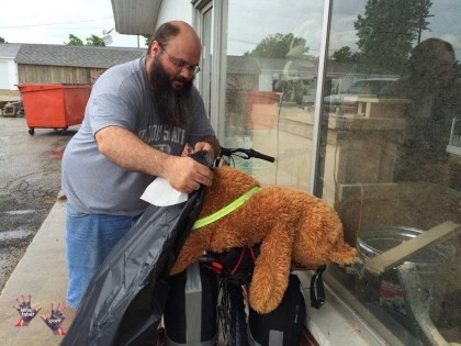 Rain coat for bear Bear before riding to Springfield